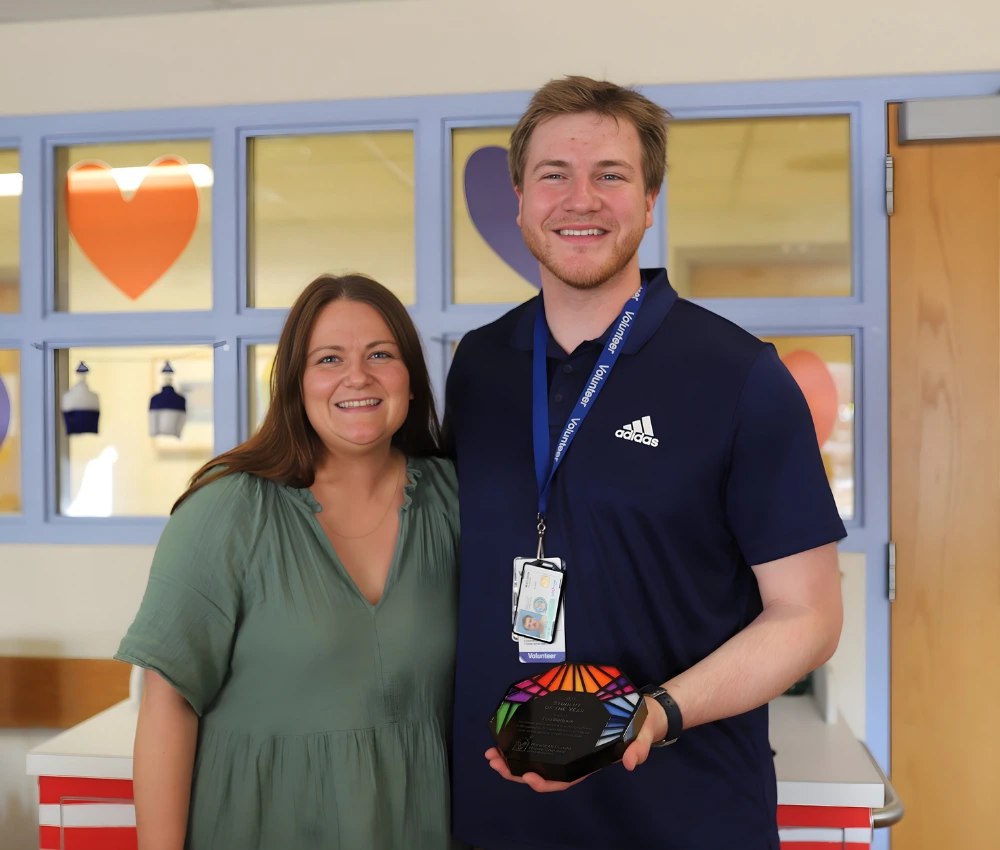 Ronald McDonald House® Family Room: Golisano Children’s at UK volunteer receiving an award