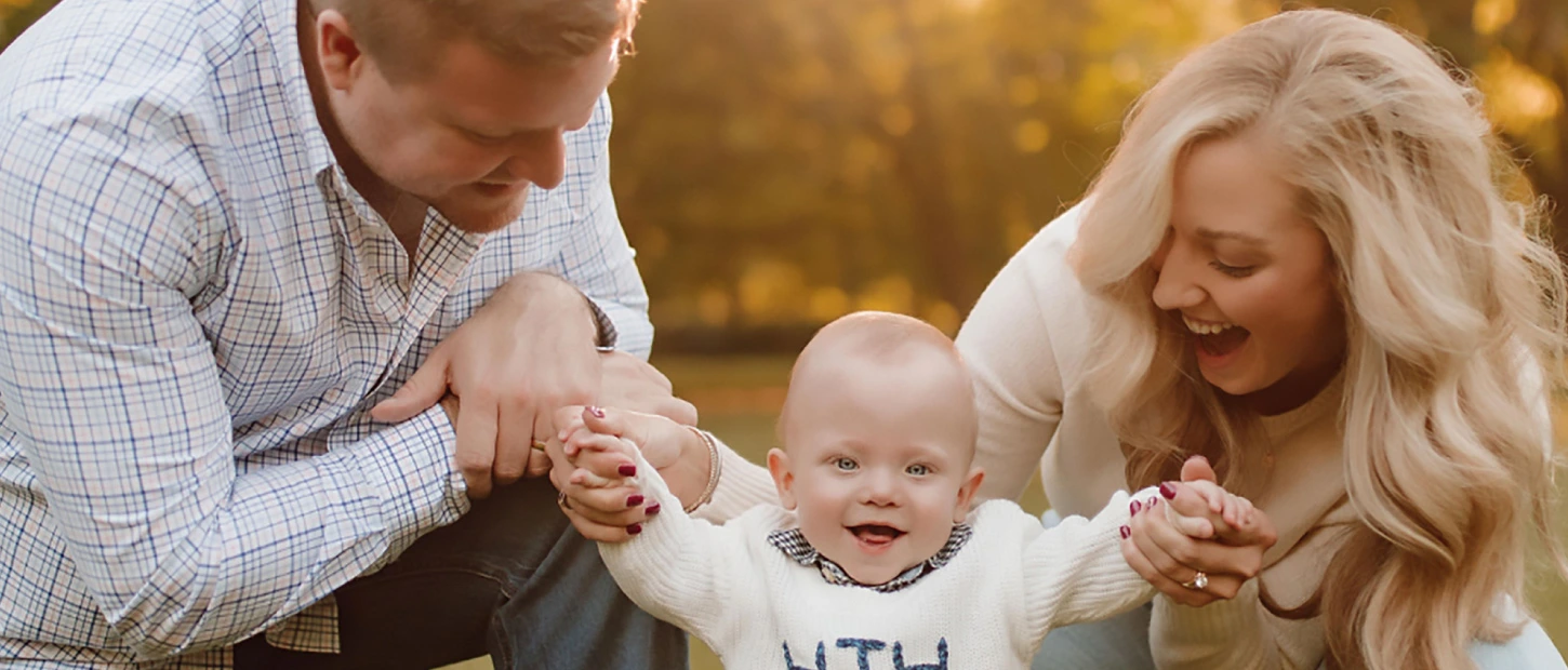 mother and father with newborn son